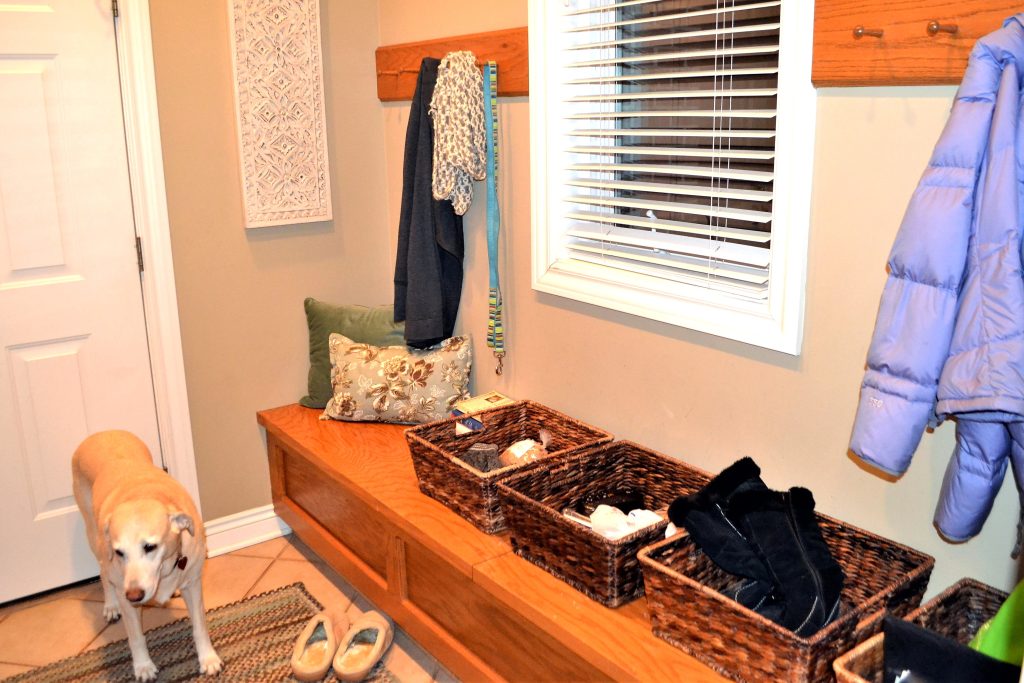 back-door-entrance-with-bins-and-hooks-for-home-or-2025-01-08-04-12-49-utc Simple mudroom with extra storage
