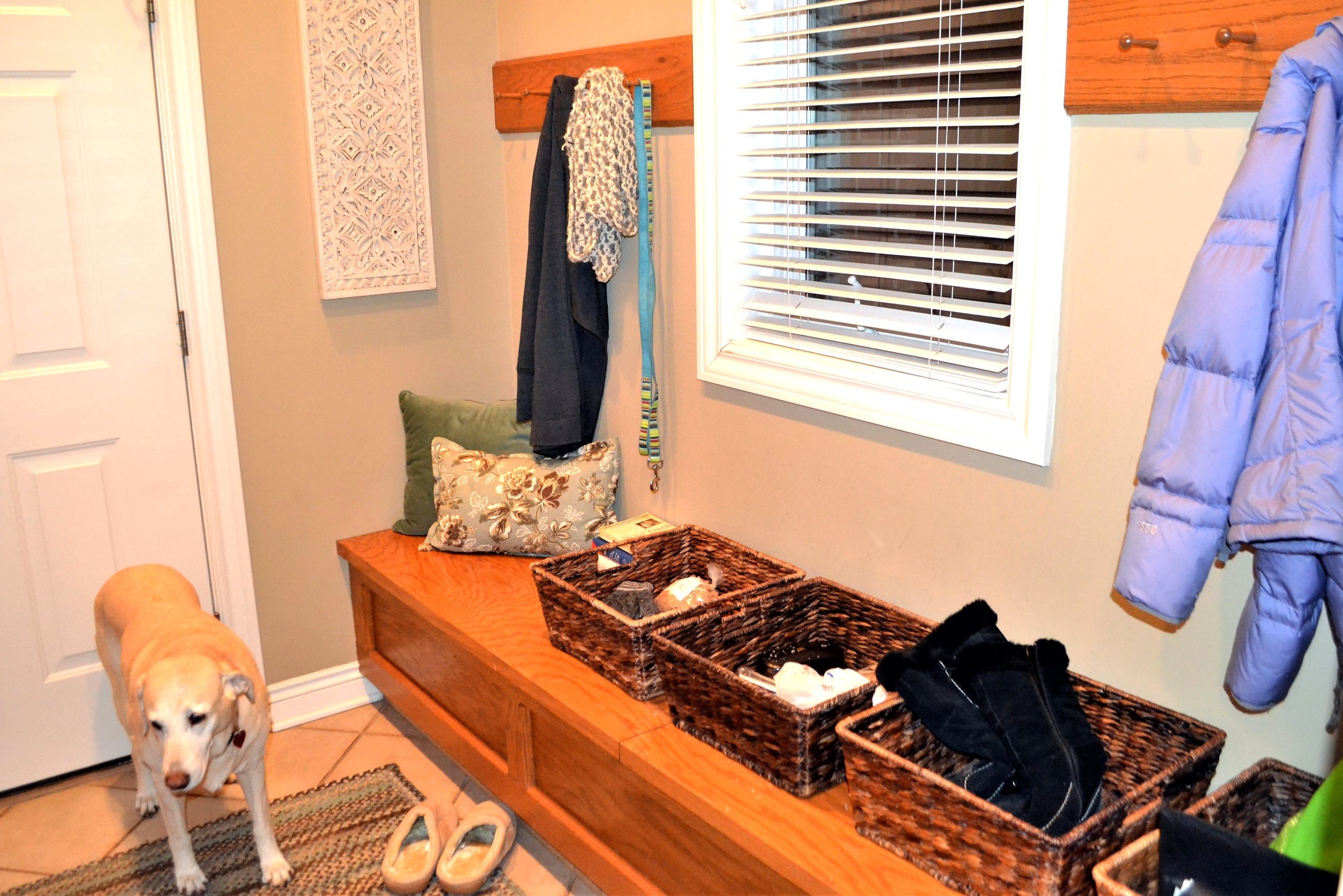 Simple mudroom with extra storage